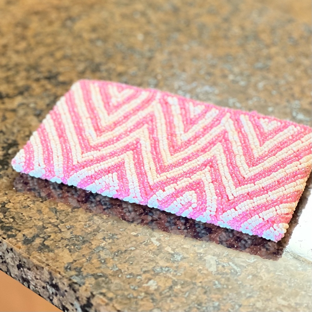 Hand beaded clutch purse. White and pink chevron pattern. Pristine! Never used.
